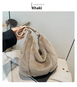 Detailed texture of the khaki faux fur tote bag with a leather strap and metal ring
