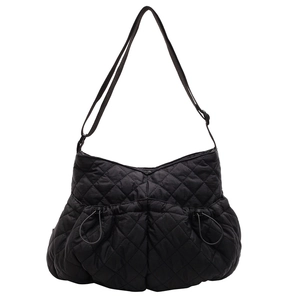 Minimalist black quilted shoulder bag with drawstring design and adjustable strap