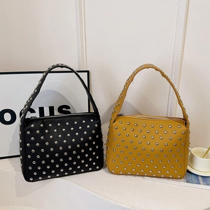 Retro punk style rivet shoulder bags in black and ginger yellow colors with PU leather
