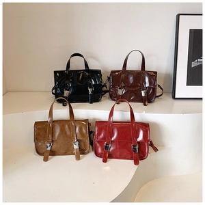 Group display of vintage PU leather messenger bags in black, brown, caramel, and red colors