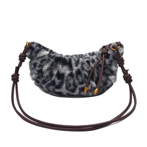 Stylish leopard print faux fur crescent bag with brown knotted strap for winter
