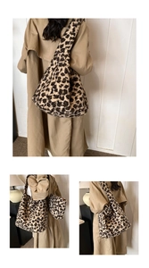 Close-up of fluffy leopard print tote bag featuring soft faux fur texture and wide strap