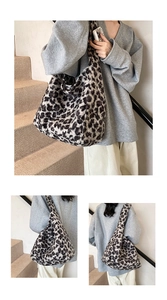 Detail of the leopard print plush tote bag showing soft faux fur texture and large capacity