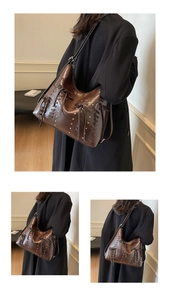 Dettaglio borsa vintage marrone scuro con cinturini a fiocco e borchie in metallo