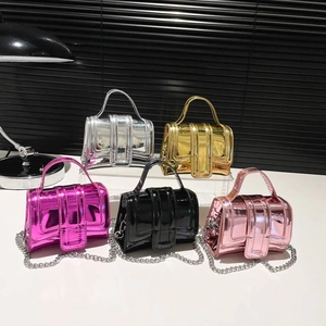 Mini glossy chain crossbody bags for women in silver, gold, pink, and black finishes