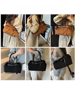 Detailed views of large matte tote bag in brown suede and black leather styles