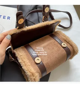 Detail of plush faux fur shoulder bag featuring strong magnetic buckle closure