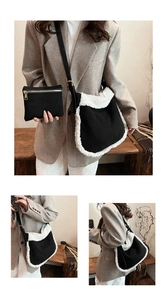 Detail of black suede hobo bag with white faux fur trim and matching small pouch