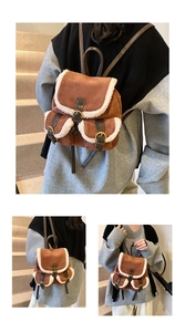 Detail of brown suede backpack featuring plush white trim and stylish leather buckle straps