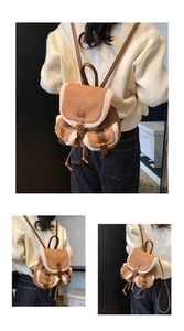 Detail of vintage suede bucket backpack with plush faux fur trim and leather straps