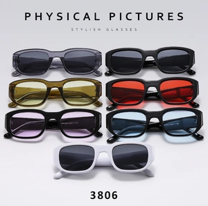 Flat lay of colorful vintage rectangle sunglasses in seven stylish Y2K fashion shades