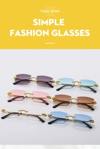 Detailed view of six rimless sunglasses with metal snake-shaped arms and golden leopard heads