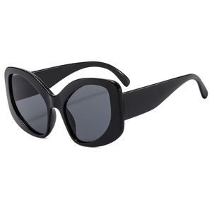 Elegant black cat eye sunglasses for women featuring classic dark grey lenses with high gloss finish