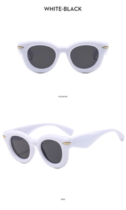 Detailed front and side views of white vintage sunglasses with gold rivets and black lenses