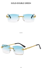 Detail of rimless sunglasses with gold snake-textured temples and blue gradient lenses