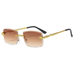 Rectangle rimless sunglasses with brown gradient lenses and golden snake temples