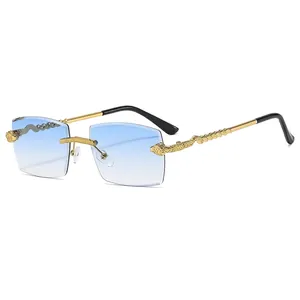 Luxurious rimless rectangular sunglasses with blue gradient lenses and gold snake temples