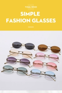 Detail view of oval rimless sunglasses in eight colors with golden metal temples