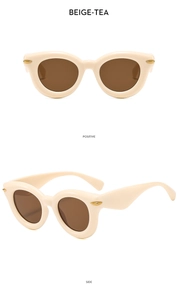 Viste frontale e laterale di occhiali da sole beige cat-eye con lenti tè e accenti dorati