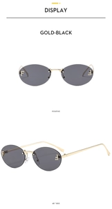 Detail of rimless oval sunglasses with gold metal frame and crystal letter F emblem