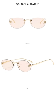 Detail view of oval rimless sunglasses featuring crystal F-logo on gold metal temples