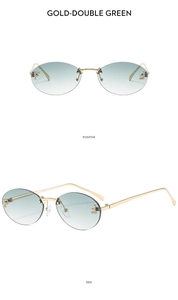 Detail view of oval rimless gold sunglasses with green gradient lenses and rhinestone accents