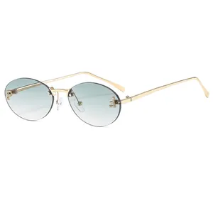 Vintage rimless oval sunglasses with gradient lenses and decorative crystals on metal arms