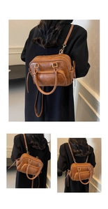 Detailed view of the vintage brown PU leather backpack with adjustable straps and zipper pocket