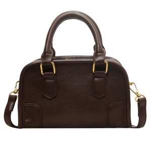 Classic dark brown Boston handbag in premium leather with gold hardware and shoulder strap