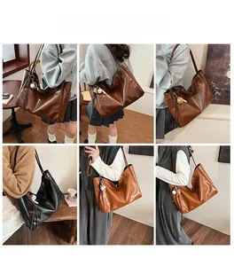 Detail shots of large retro tote bag showing dark brown and black colors and charms