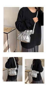 Fashion silver metallic puffy shoulder bag, trendy pleated nylon cloud bucket bag for women.