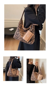 Retro leopard print hobo bag with a beige mini pouch shown in a styled fashion pose