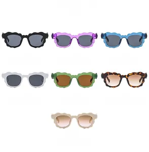 Collection of scalloped frame sunglasses in various colors including black and tortoise