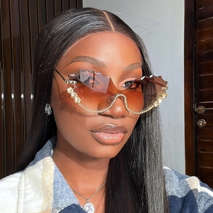 Lunettes de soleil luxe sans monture avec verres ondulés dégradés et strass brillants