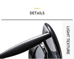 Close-up of sleek black oval frame hinge showing high-gloss finish and light texture