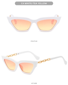 Détail de lunettes œil de chat blanches avec branches en chaîne dorée sous deux angles