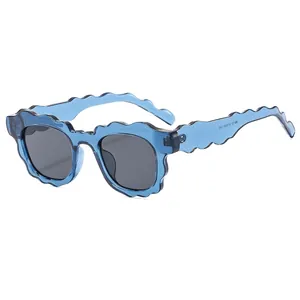 Chic cloud-shaped scalloped sunglasses with blue wavy frames and dark lenses