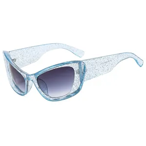 Light blue glitter cat eye sunglasses with grey gradient lenses in a 45-degree view