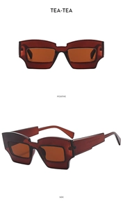 Détail de lunettes de soleil rectangulaires marron avec marquages UV400 et CE