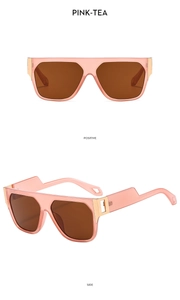Detail view of pink-tea square sunglasses with wide temples and golden metal ornaments