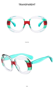 Detail view of oval sunglasses featuring red and green stripe accents on clear frames