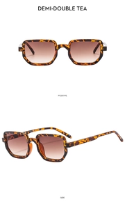Detail view of demi-double tea retro sunglasses with tortoise frames and brown lenses