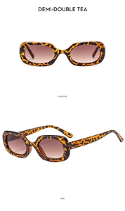 Front and side views of vintage tortoiseshell sunglasses with brown gradient lenses