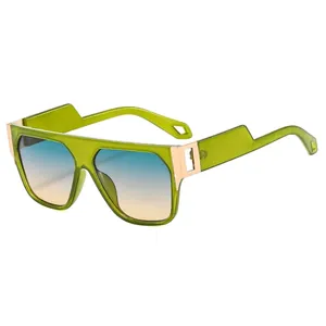 Square sunglasses with green translucent frames, gradient lenses and gold temple accents