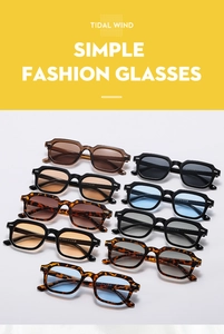 Detail of square vintage sunglasses with metallic rivets and assorted tinted lenses