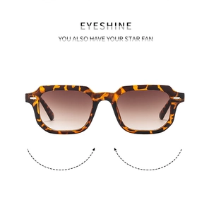 Detailed close-up of retro square tortoiseshell sunglasses with brown gradient lenses