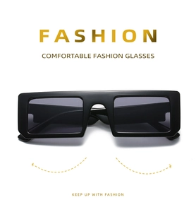 Front view of retro black rectangular sunglasses with dark gray lenses on white background