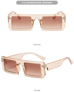 Detail view of retro champagne rectangle sunglasses with brown gradient lenses