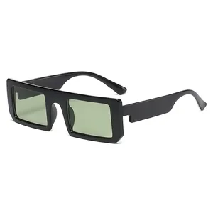 Modern rectangular black thick frame sunglasses with light green lenses in a vintage style