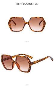 Vue détaillée des lunettes de soleil hexagonales écaille avec verres dégradés marron chic